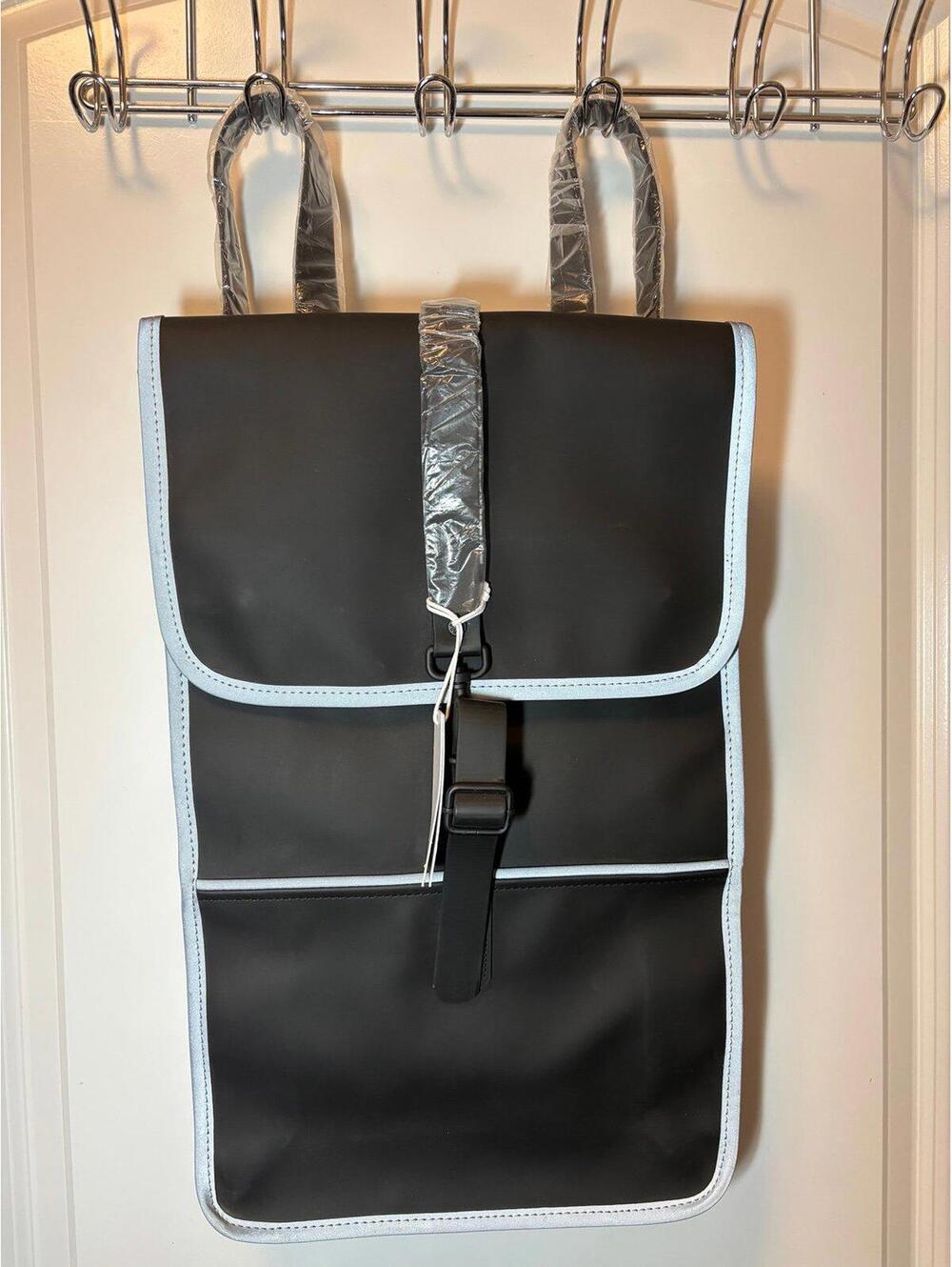 Rains Black Reflective Backpack